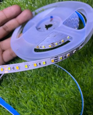 Remote control switching the dual white LED strip between warm and cool light tones.